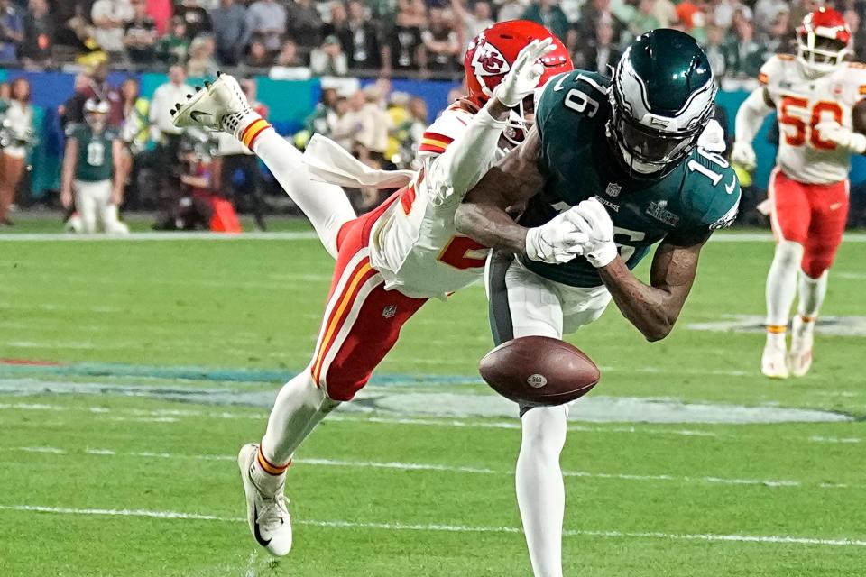 Philadelphia Eagles wide receiver Quez Watkins (16) cannot catch a pass against Kansas City Chiefs safety Juan Thornhill during the second half of Super Bowl 57 on Sunday, Feb. 12, 2023, in Glendale, Ariz.