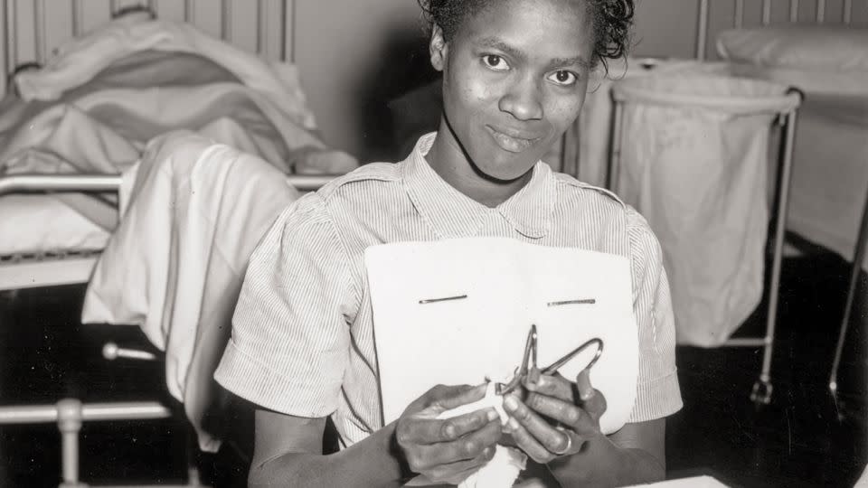 A Nigerian nurse at Brook General Hospital, London, in 1958. The postwar decades saw the NHS recruit heavily from Commonwealth and Caribbean countries to meet a shortfall in nursing staff. - George W. Hales/Fox Photos/Getty Images