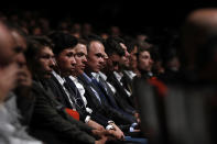 Britain's Chris Froome, center, attends the presentation of the Tour de France 2020 cycling race, in Paris, Tuesday Oct. 15, 2019. The 107th edition of the race starts on June 27 2019 to end on the Champs-Elysees avenue on July 19. (AP Photo/Thibault Camus)