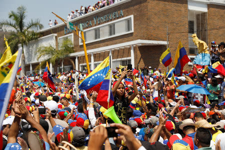 Supporters of Venezuelan opposition leader Juan Guaido, who many nations have recognised as the country's rightful interim ruler, take part in a rally against Venezuelan President Nicolas Maduro's government, in Valencia, Venezuela March 16, 2019. REUTERS/Carlos Jasso