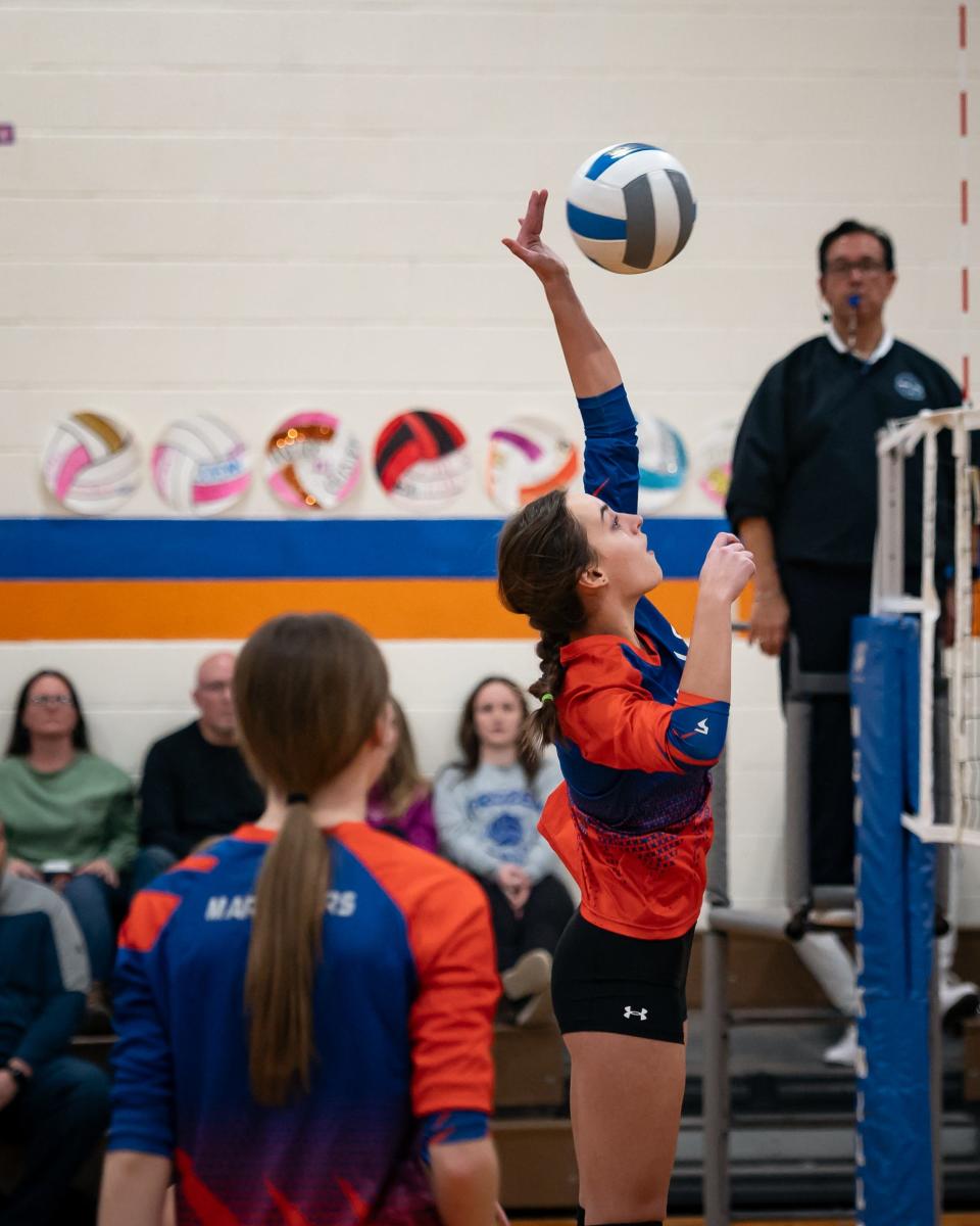 New York Mills' Isabella Zalocha spikes the ball during the first round of the Section III Class D Sectional Championships Wednesday.