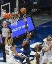 Minnesota Timberwolves forward Jaden McDaniels, second from left, goes up for a shot as Brooklyn Nets forward Nicolas Claxton, left, Nets forward Kevin Durant, second from right, and Nets forward Joe Harris look on during the first half of an NBA basketball game Tuesday, April 13, 2021, in Minneapolis. (AP Photo/Craig Lassig)