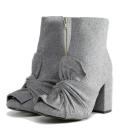 <p><a rel="nofollow noopener" href="http://www.asos.com/glamorous/glamorous-grey-knotted-bow-heeled-ankle-boots/prd/8280552?clr=grey&SearchQuery=boots&pgesize=204&pge=1&totalstyles=764&gridsize=4&gridrow=25&gridcolumn=3" target="_blank" data-ylk="slk:Glamorous;elm:context_link;itc:0;sec:content-canvas" class="link ">Glamorous</a> – £42 </p>