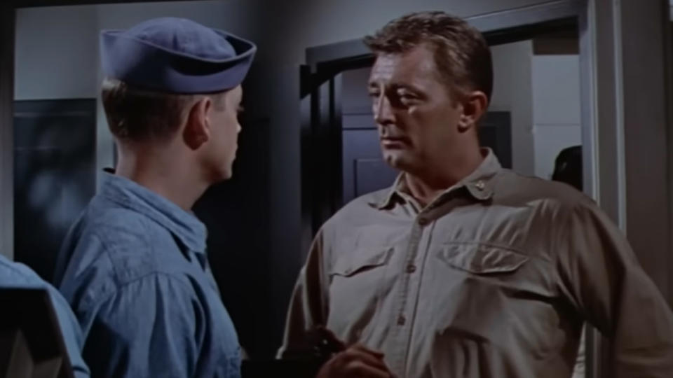 Robert Mitchum talking another actor in The Enemy Below
