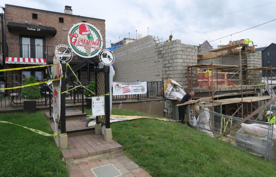The West Front Street building that houses Italian Gourmet Delights, Salon 29, Regency Management Group and First Lenders Mortgage (left) in Keyport was condemned due to an internal wall that collapsed because of adjacent construction. Work on the new building continues Tuesday, May 14, 2024.