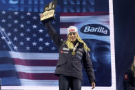 United States' Mikaela Shiffrin poses with the gold medal of the women's World Championship giant slalom, in Meribel, France, Thursday Feb. 16, 2023. (AP Photo/Alessandro Trovati)