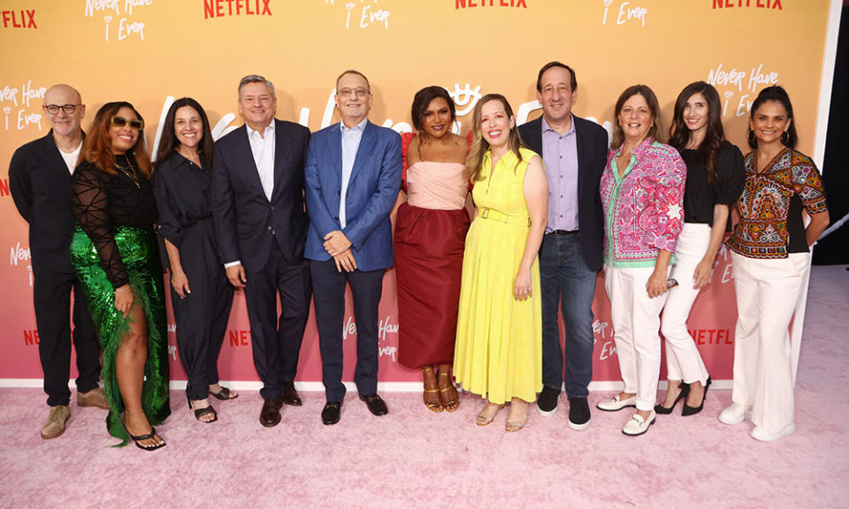 Head of UCAN Scripted Series at Netflix Peter Friedlander, Manager of Comedy Series at Netflix Jasmyn Lawson, VP, Comedy Original Series, UCAN/UK at Netflix Tracey Pakosta, CEO of Netflix Ted Sarandos, Howard Klein, Mindy Kaling, Lang Fisher, David Miner, Head of Universal TV Programming JoAnn Alfano, Director of Original Series, Comedy at Netflix Brooke Kessler and Netflix Global Head of TV Bela Bajaria attend the Los Angeles premiere of Netflix's "Never Have I Ever" Season 3 on August 11, 2022 in Los Angeles, California.