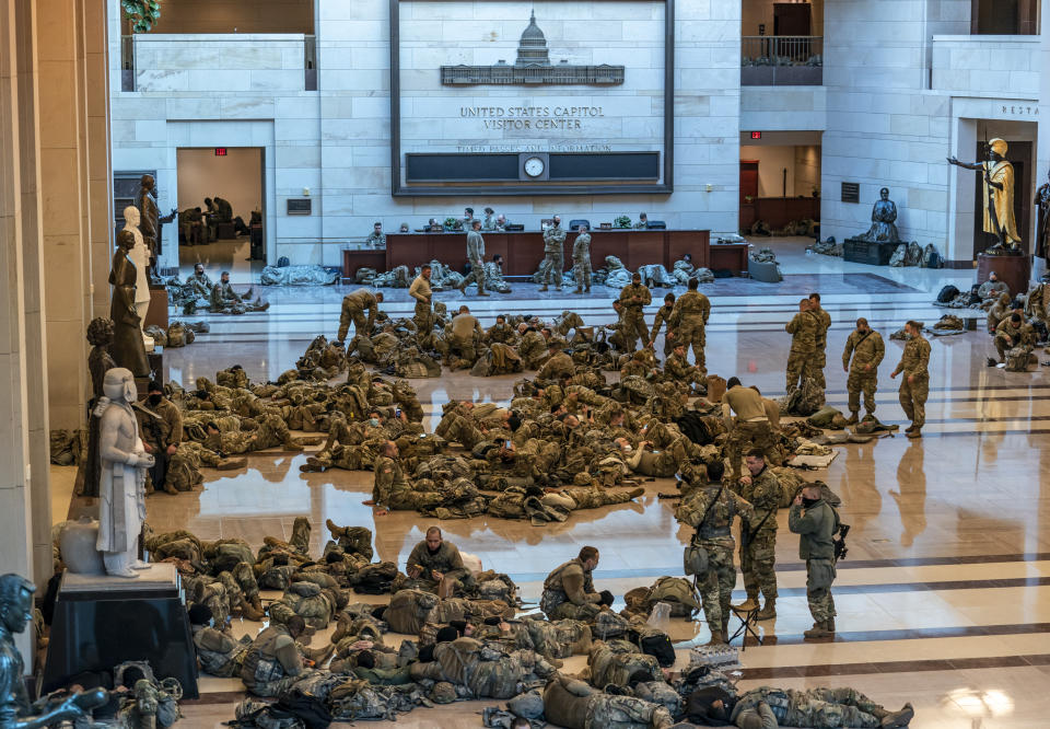 Hundreds of National Guard troops in repose inside the Capitol 