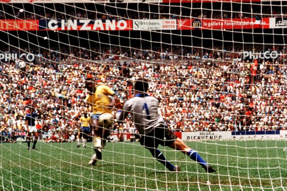 Brazil's Pele (left) sees his shot saved by Italy goalkeeper Enrico Albertosi (right)  (Photo by Peter Robinson/EMPICS via Getty Images)