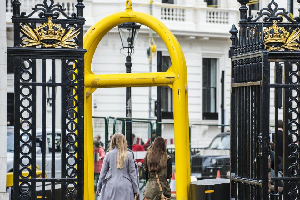 Bright yellow anti-terror gates near Buckingham Palace, installed following the Westminster terror attack: Lucy Young