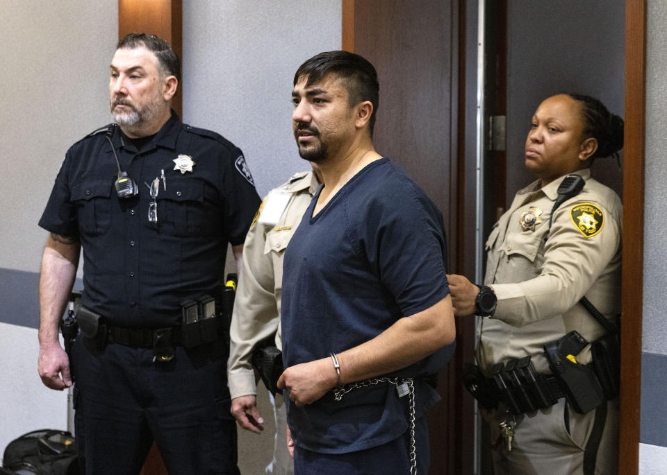 Mohammed Mesmarian appears in court during his arraignment at the Regional Justice Center, on Tuesday, Jan. 10, 2023, in Las Vegas. Mesmarian, 34, has been jailed since his arrest last Thursday in the attack at the solar array northeast of Las Vegas. He is accused of breaking through a fence and setting a vehicle afire next to an electric transformer serving several Las Vegas Strip resorts owned by MGM Resorts International. (Bizuayehu Tesfaye/Las Vegas Review-Journal via AP)