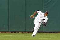 DETROIT, MI - OCTOBER 13: Austin Jackson #14 of the Detroit Tigers drops a hit by Mike Napoli #25 of the Texas Rangers in the sixth inning of Game Five of the American League Championship Series at Comerica Park on October 13, 2011 in Detroit, Michigan. (Photo by Leon Halip/Getty Images)