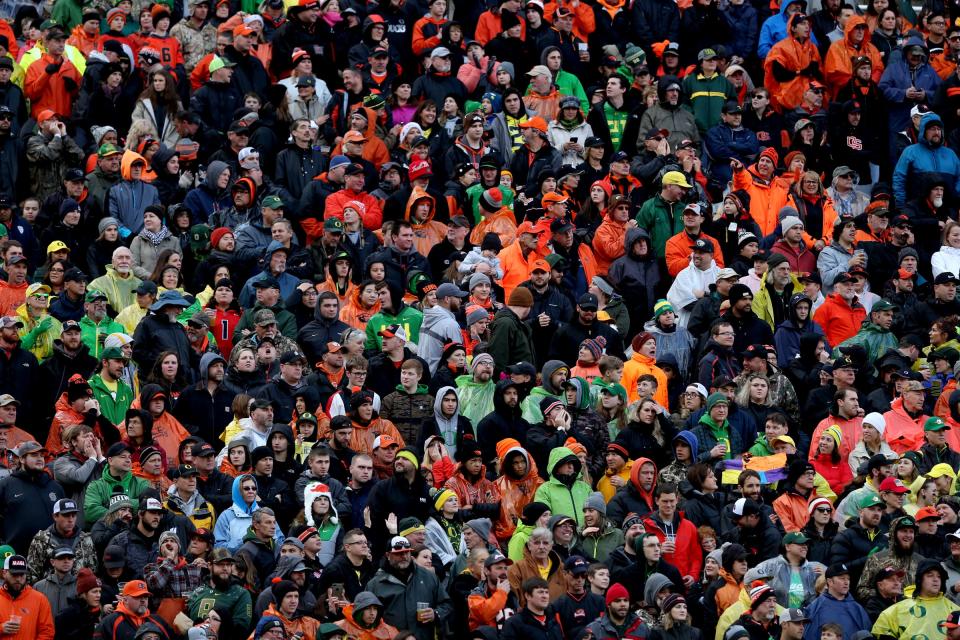 Fans fill Reser Stadium for the Oregon vs. Oregon State football game in 2018. The West's oldest rivalry extends beyond Oregon's borders with fans meeting up across the nation to watch the game.