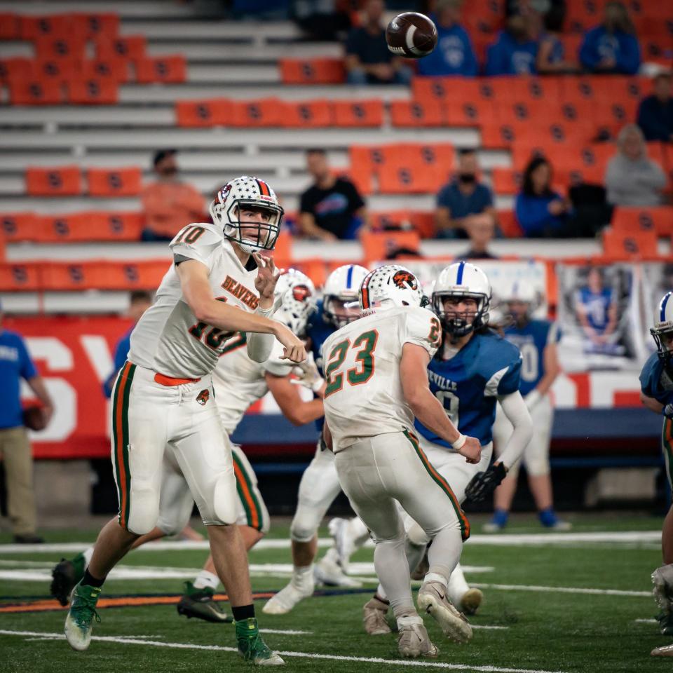 Beaver River's Derrick Zehr throws a pass against Dolgeville inside of the JMA Wireless Dome at Section III's 2022 Class D championship game.
