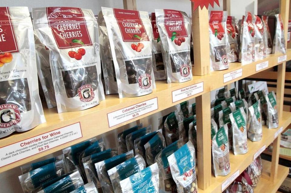 An assortment of bags filled with Chukar Cherries line the display shelves at the Prosser store.