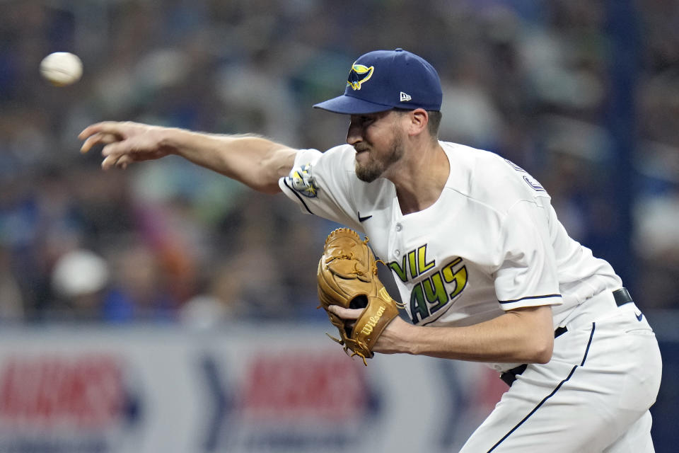 Tampa Bay Rays relief pitcher Cooper Criswell delivers to the Los Angeles Dodgers during the third inning of a baseball game Friday, May 26, 2023, in St. Petersburg, Fla. (AP Photo/Chris O'Meara)