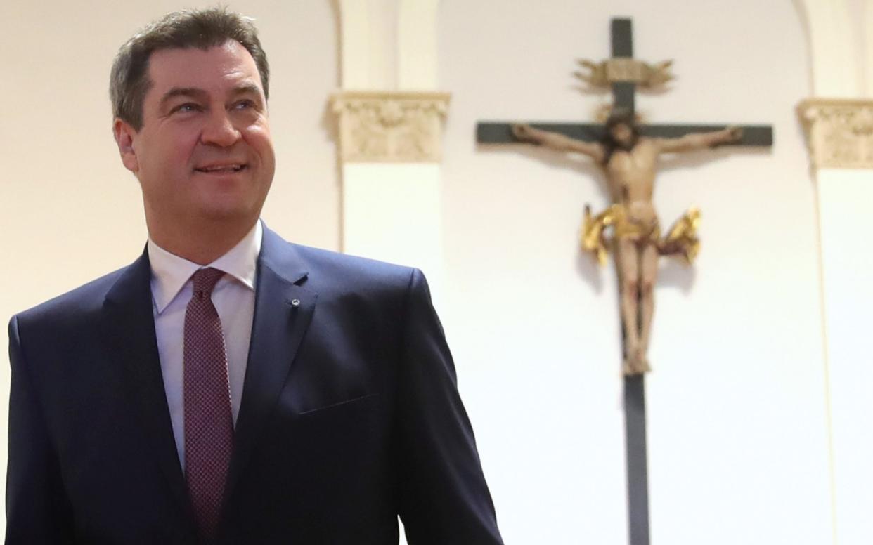 Markus Söder, the regional prime minister, said the cross was a fundamental symbol of Bavarian identity - Getty Images Europe