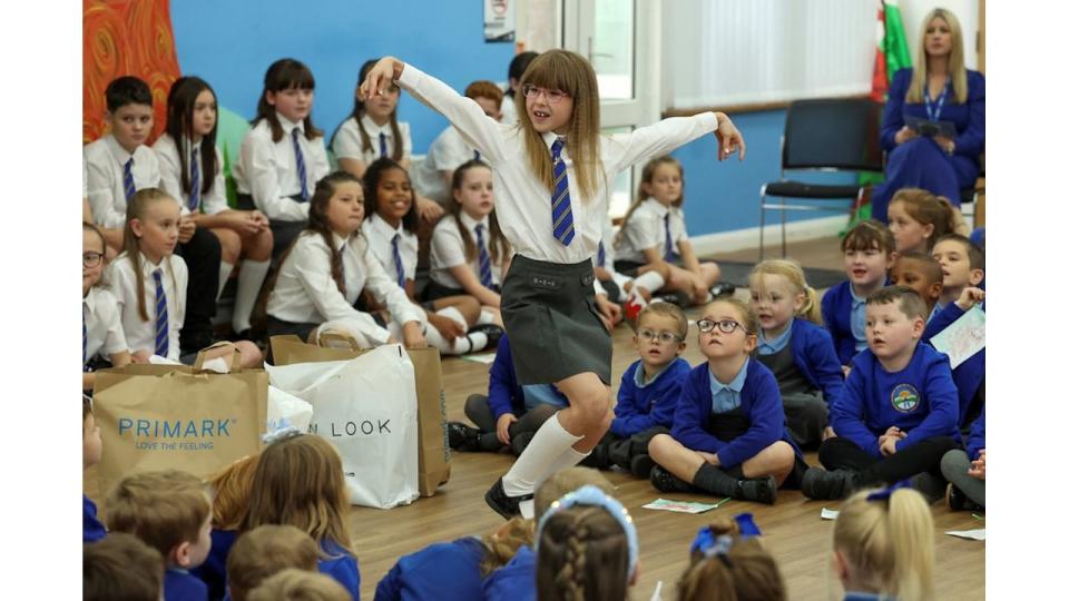 Pupil Ruby Davies performs for Prince William during his visit at Swiss Valley Community Primary School