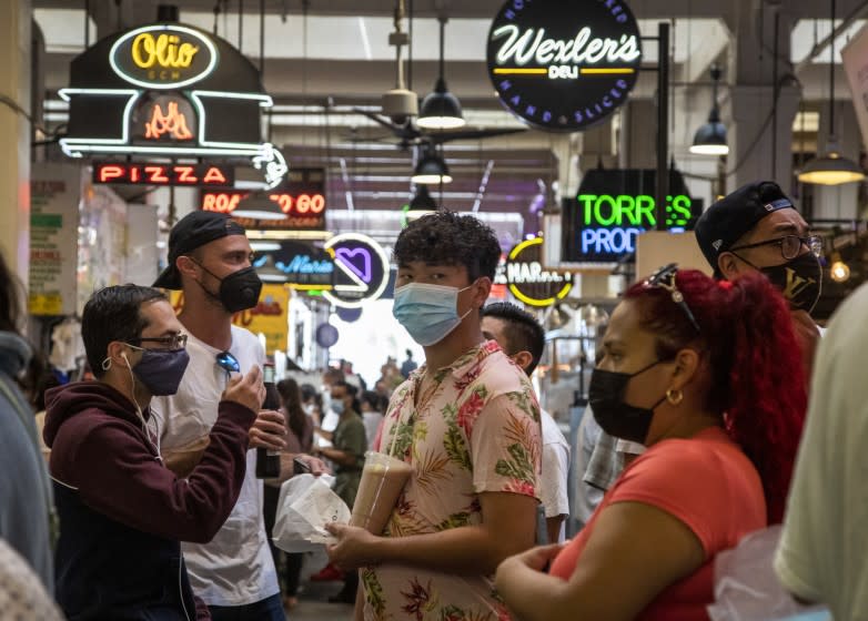 LOS ANGELES, CA - JULY 27, 2021- Visitors to the Grand Central Market are mostly masked on Tuesday, July 27, 2021 in Los Angeles, CA. (Brian van der Brug / Los Angeles Times)