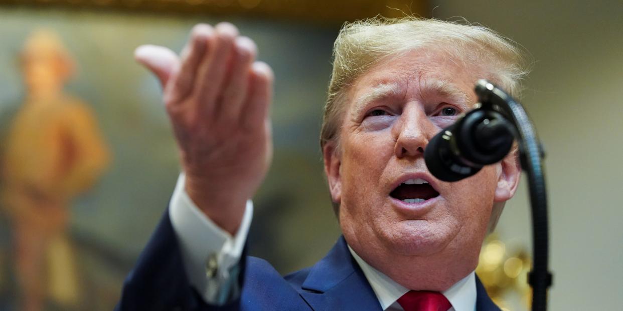 U.S. President Donald Trump answers questions from reporters about impeachment and Iran during an event to announce proposed rollbacks to the National Environmental Policy Act regulations in Roosevelt Room of the White House in Washington, U.S., January 9, 2020. REUTERS/Kevin Lamarque