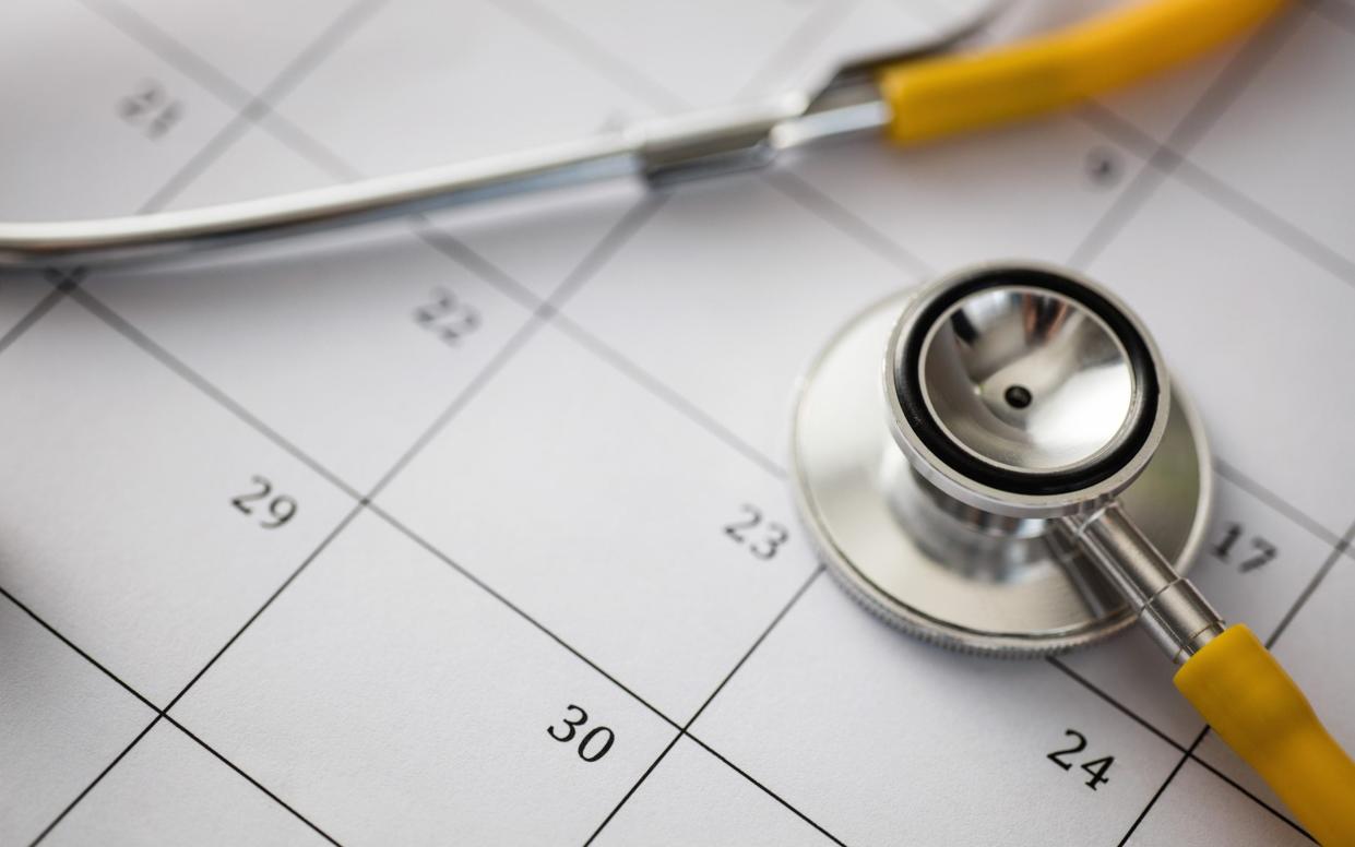 A file image of a stethoscope on top of a calendar