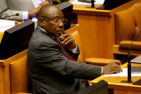 Cyril Ramaphosa listens to debate in Parliament in Cape Town in Parliament in Cape Town, South Africa, February 15, 2018. REUTERS/Mike Hutchings/Files