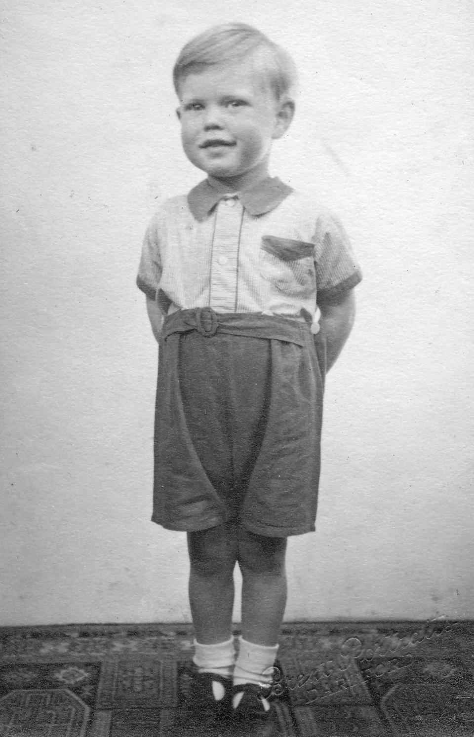 Mick Jagger, aged 3, at home in Brent Lane, Dartford (1946). (Stones Archive / Getty Images)