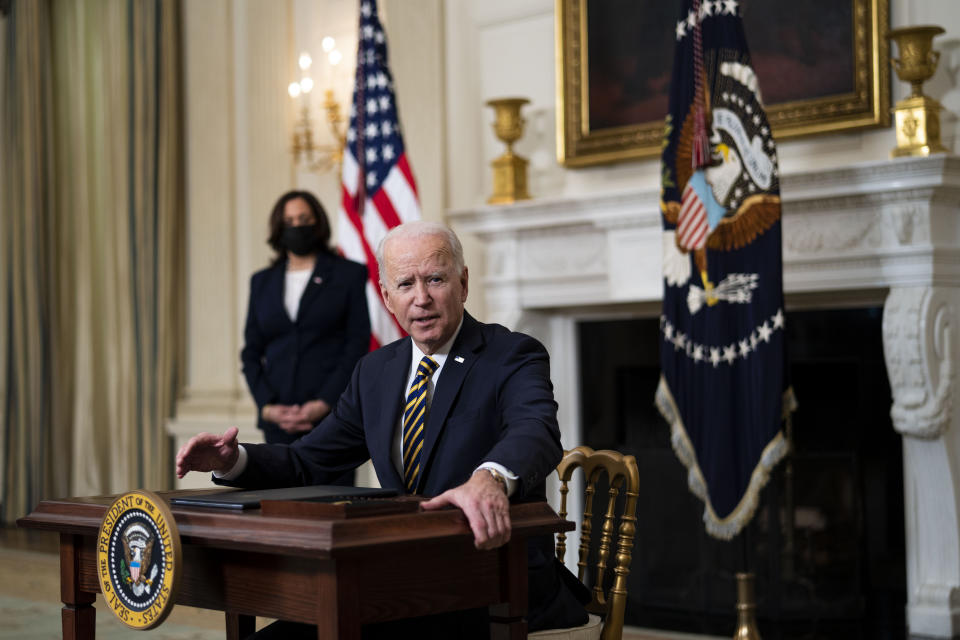 WASHINGTON, DC - FEBRUARY 24: U.S. President Joe Biden signs an Executive Order on the economy with Vice President Kamala Harris February 24, 2021 in the State Dining Room of the White House in Washington, DC. The order is intended to address a global shortage of semiconductors, or computer chips, as well as a multi-sector economic review regarding how to shore up supply chains. (Photo by Doug Mills-Pool/Getty Images)