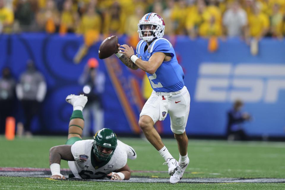 Matt Corral of the Mississippi Rebels looks to pass against the Baylor Bears during the first quarter in the Allstate Sugar Bowl at Caesars Superdome on January 01, 2022 in New Orleans, Louisiana.