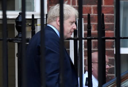 Britain's Prime Minister Boris Johnson leaves Downing Street, in London