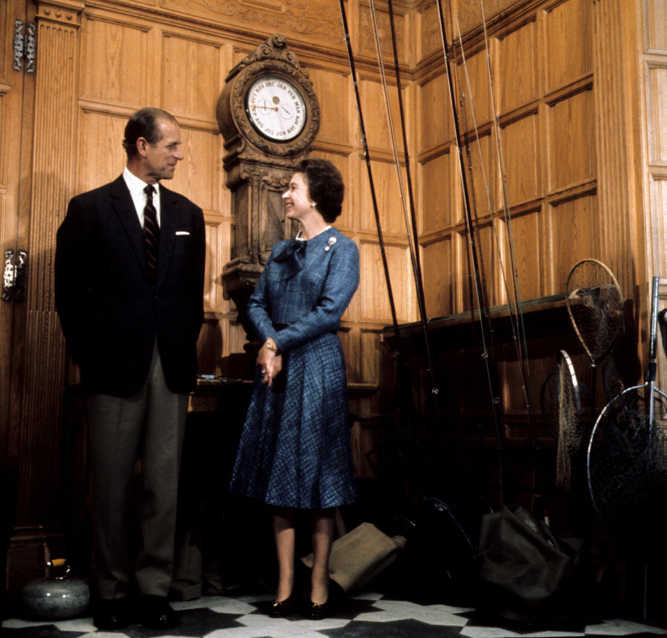 Queen Elizabeth II and the Duke of Edinburgh during their traditional summer break at Balmoral Castle in 1976. (PA)