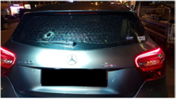 A man allegedly broke the windshields of two cars by throwing pebbles at them. (Photo: Singapore Police Force)