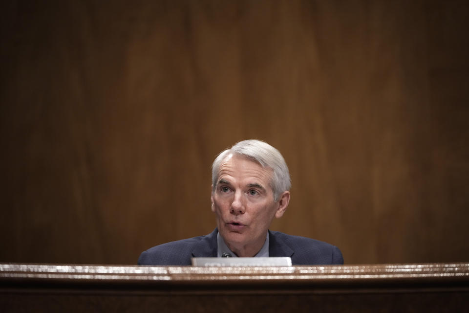 Ranking member Sen. Rob Portman, R-Ohio, questions Deanne Criswell, President Joe Biden's choice to be FEMA administrator, as she testifies at her confirmation hearing before the Senate Homeland Security Committee, on Capitol Hill in Washington, Thursday, March 25, 2021. (Drew Angerer/Pool via AP)