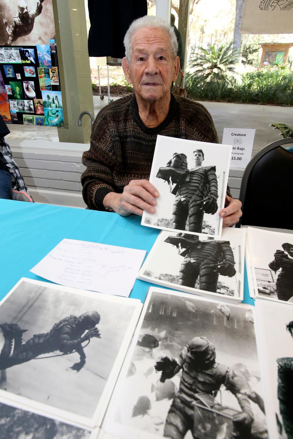 Ricou Browning, who played the creature in "Creature from the Black Lagoon," poses for photos for people during Florida SpringsFest at Silver Springs State Park in Silver Springs, Fla., Sunday, March 4, 2018. Browning, best known for playing the Gill Man in the 1954 monster movie “Creature from the Black Lagoon,” has died. His family told news outlets Browning died Feb. 27, 2023, at his home in Southwest Ranches, Fla. He was 93.
