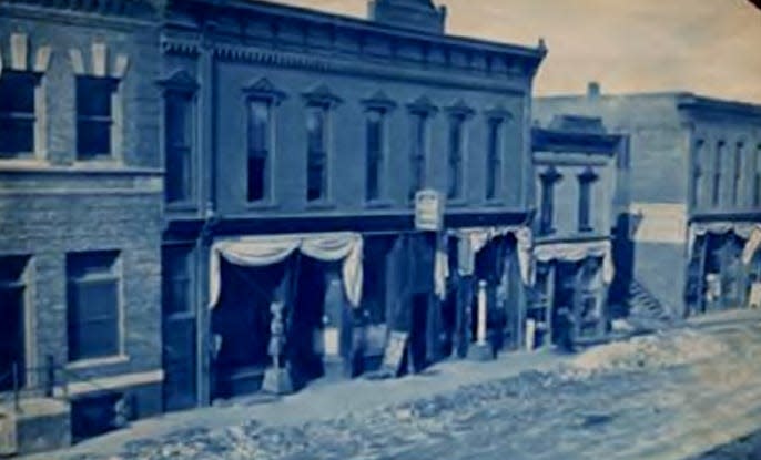 Did you know... what businesses are shown in this photo of 2nd Street?