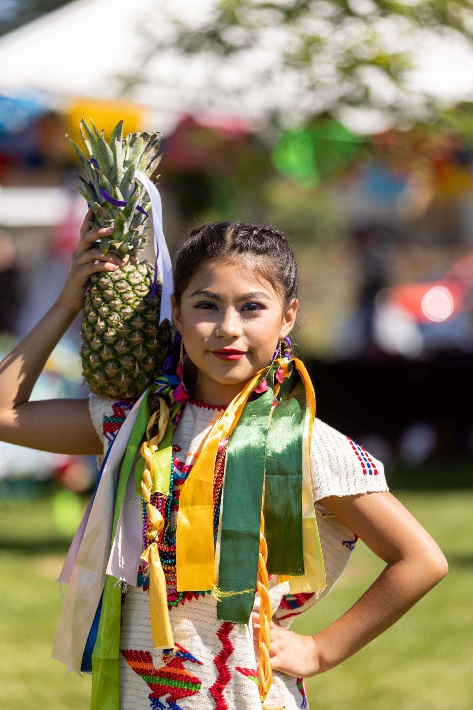 Gladys Duenas poses at La Guelaguetza at Heritage Park in Kaysville on Saturday, July 22, 2023. La Guelaguetza is an event held to celebrate the rich culture and traditions of Oaxaca, Mexico. | Megan Nielsen, Deseret News