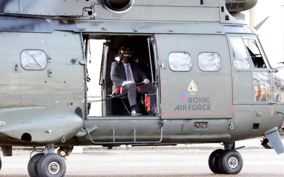 Boris Johnson in an RAF helicopter - Nigel Howard