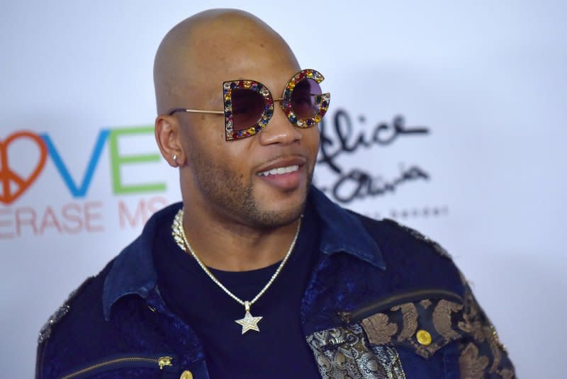 Flo Rida arrives on the orange carpet for the 26th Annual Race to Erase MS Gala at the Beverly Hilton hotel in on May 10, 2019. The rapper turns 44 on September 16. File Photo by Chris Chew/UPI