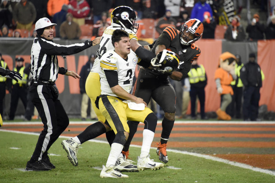 Steelers quarterback Mason Rudolph got hit in the head with a helmet by Browns end Myles Garrett. (Photo by Jason Miller/Getty Images)