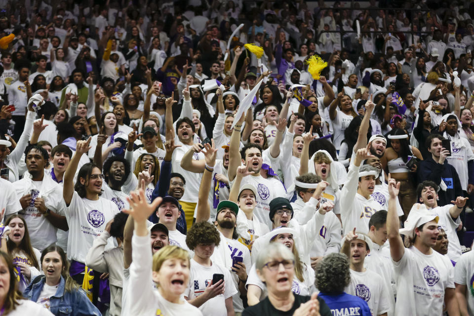 LSU fans celebrate following a win over Tennessee in an NCAA college basketball game in Baton Rouge, La., Monday, Jan. 30, 2023. (AP Photo/Derick Hingle)