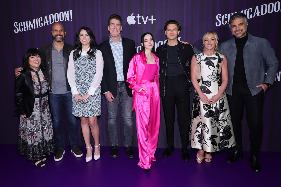 NEW YORK, NEW YORK - MARCH 21: (L-R) Ann Harada, Keegan-Michael Key, Cecily Strong, Cinco Paul, Dove Cameron, Aaron Tveit, Jane Krakowski and Jaime Camil attend the photo call for Apple TV+'s 