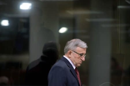 FILE PHOTO: Vladimir Lazarevic enters the courtroom of the Yugoslav war crimes tribunal in The Hague January 23, 2014.  REUTERS/Peter Dejong/Pool