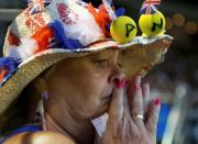 A supporter of Britain's Andy Murray reacts as she watches his final match against Serbia's Novak Djokovic at the Australian Open tennis tournament at Melbourne Park, Australia, January 31, 2016. REUTERS/Brandon Malone