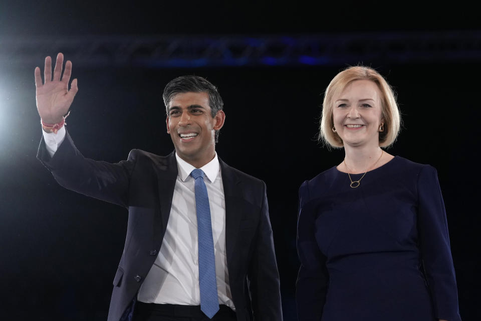 FILE - Liz Truss, right, and Rishi Sunak on stage after a Conservative leadership election hustings at Wembley Arena in London, Wednesday, Aug. 31, 2022. After weeks of waiting, Britain will finally learn who will be its new prime minister. Truss has only been in office for six weeks. But already her libertarian economic policies have triggered a financial crisis, emergency central bank intervention, multiple U-turns and the firing of her Treasury chief. (AP Photo/Kirsty Wigglesworth, File)