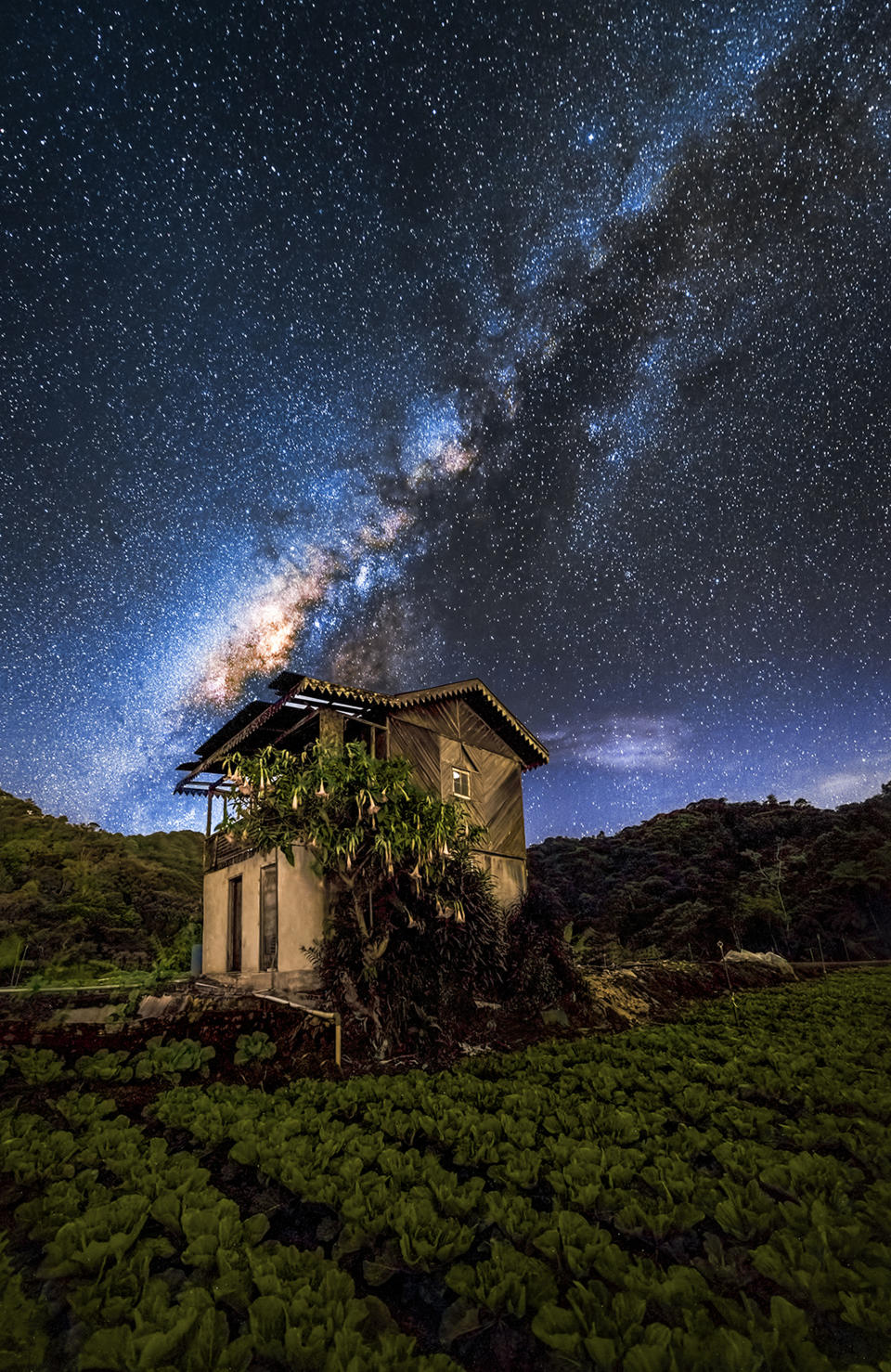 The Milky Way shines down on Mount Fuji