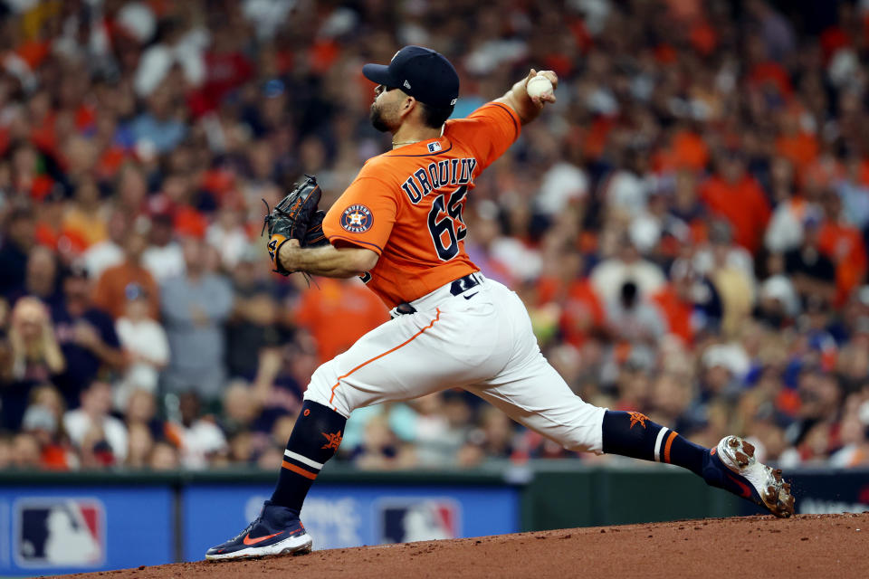 HOUSTON, TX - OCTOBER 27:  José Urquidy #65 of the Houston Astros pitches in the first inning during Game 2 of the 2021 World Series between the Atlanta Braves and the Houston Astros at Minute Maid Park on Wednesday, October 27, 2021 in Houston, Texas. (Photo by Mary DeCicco/MLB Photos via Getty Images)