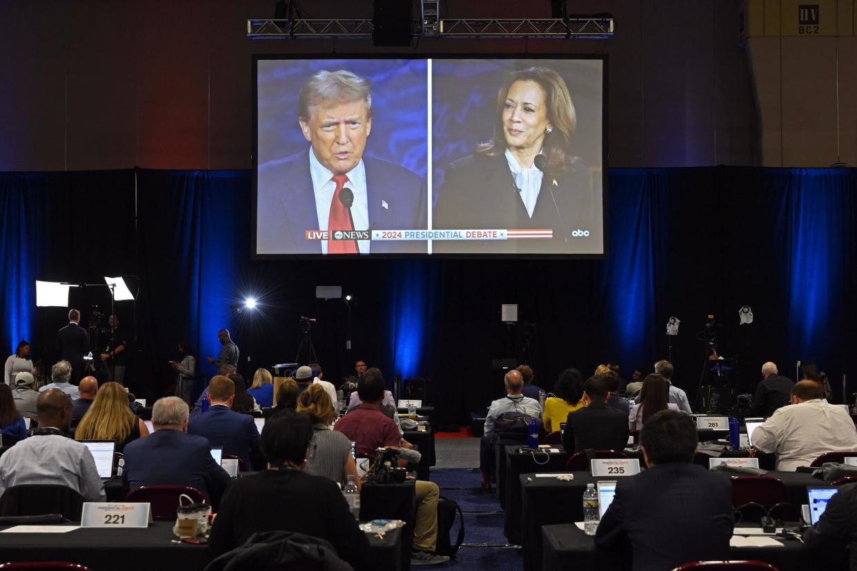 <span>A live broadcast of the debate between Donald Trump and Kamala Harris in Philadelphia, on 10 September 2024.</span><span>Photograph: Xinhua/Rex/Shutterstock</span>