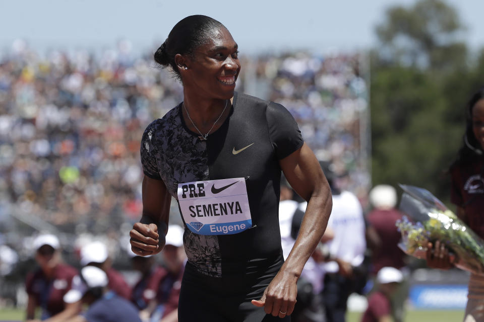 FILE - In this June 30, 2019 file photo, South Africa's Caster Semenya smiles after winning the women's 800-meter race during the Prefontaine Classic, an IAAF Diamond League athletics meeting, in Stanford, Calif. Olympic champion Caster Semenya has run her first public race in eight months and says she will be back in top-level track despite currently being banned from competing in her favorite event. (AP Photo/Jeff Chiu, File)