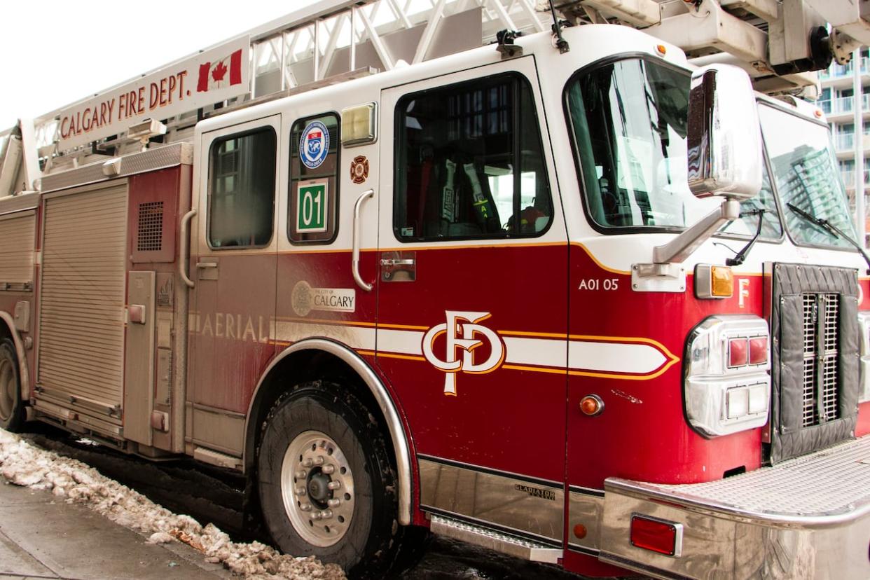 Fire crews responded to a call from a northeast Calgary residence Tuesday. Three people were taken to the hospital following a dangerous accumulation of carbon monoxide inside their home. (Oseremen Irete/CBC - image credit)