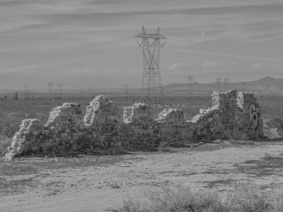 The uneven ruins of a wall from the Llano colony.